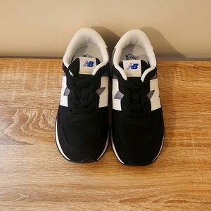 Gently worn Boys New Balance Running shoe size 2 Black/White